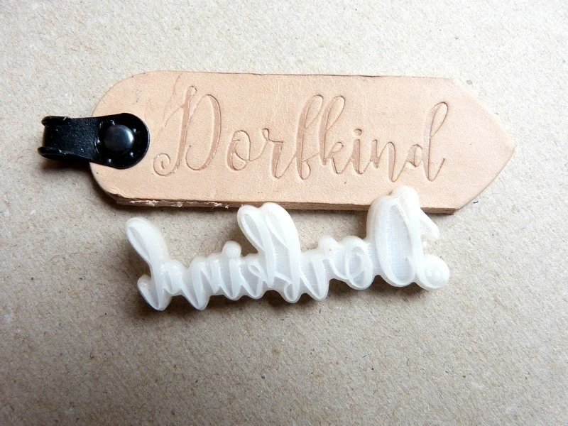 Prägestempel "Dorfkind_1"